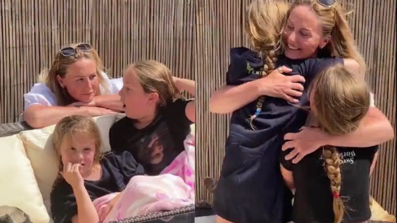 Mãe em reencontro com filhas após nove semanas - Twitter